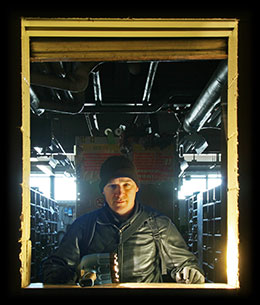 Portrait of Kendall Anderson, inside an abandoned coal-fired power station